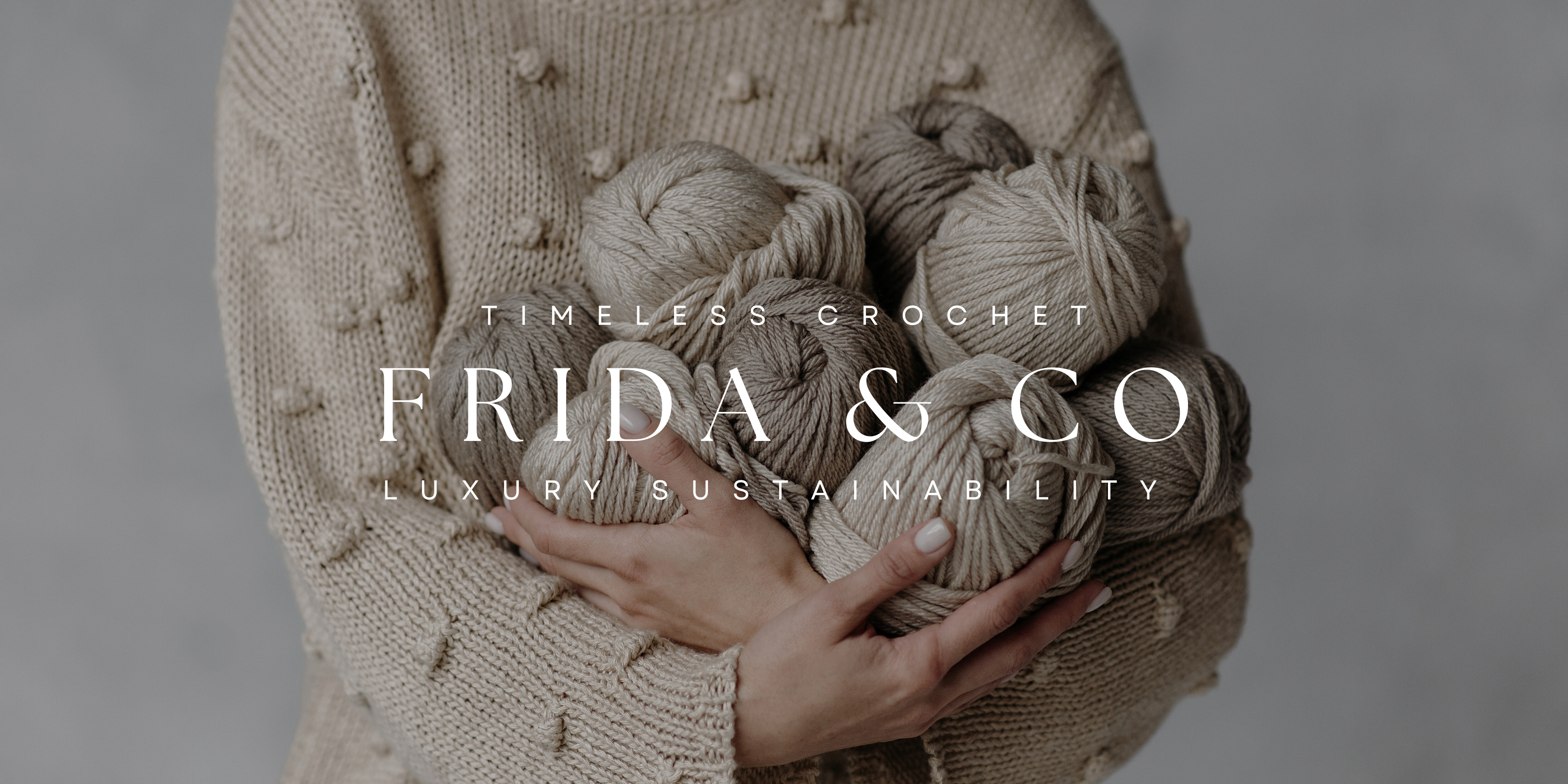 Frida and Co. Banner. Photograph: A Person in Beige Knitted Sweater Holding Yarns by Pavel Danilyuk from Pexels