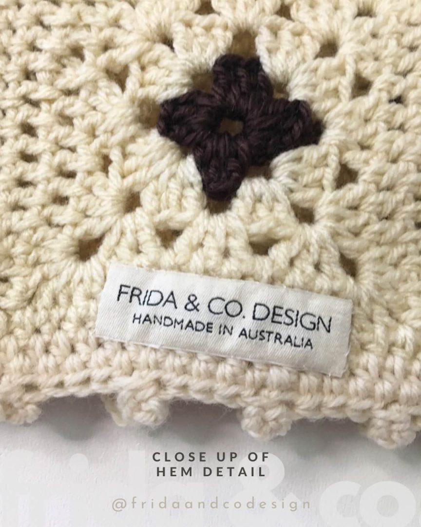 Frida & Co clothing label on crocheted item